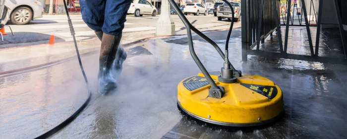 Power washing on sidewalk