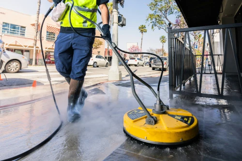 Power washing on sidewalk